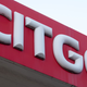A photo of the Cigto logo on a gas station